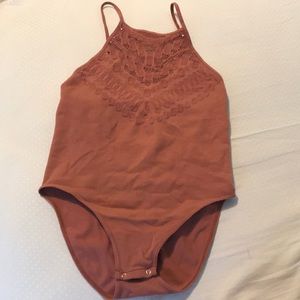 NWOT Free people bodysuit mauve color